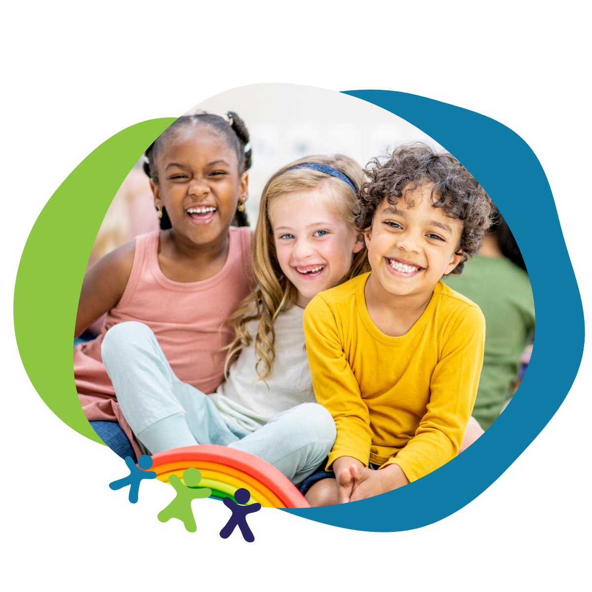 group of three children sitting and smiling